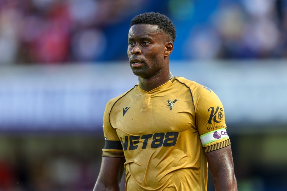 Marc Guéhi of Crystal Palace in a gold jersey.