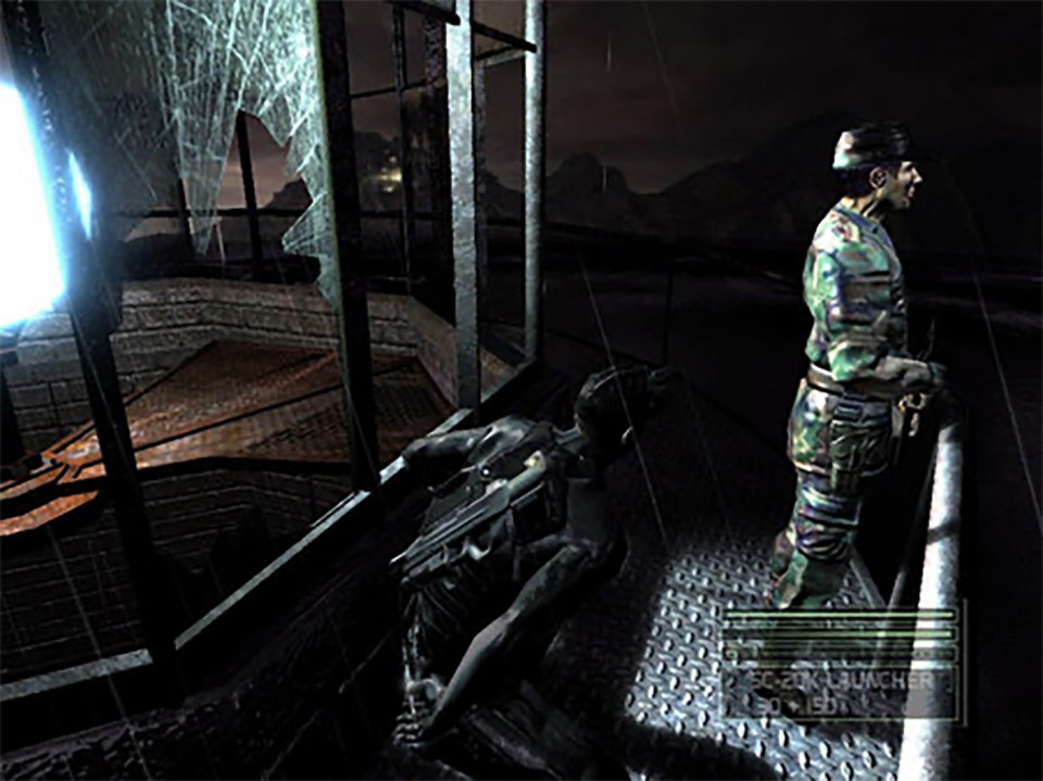 Screenshot from a video game showing a soldier and a crouched figure in a dark, rainy environment.
