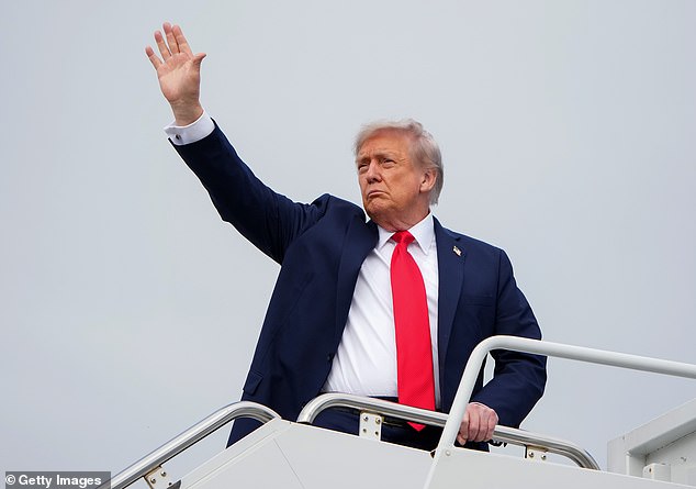 President Donald Trump boards Air Force One as he departs Joint Base Elmendorf-Richardson on August 15, 2025