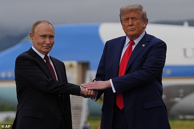 Donald Trump greets Vladimir Putin at Joint Base Elmendorf-Richardson in Alaska on Friday