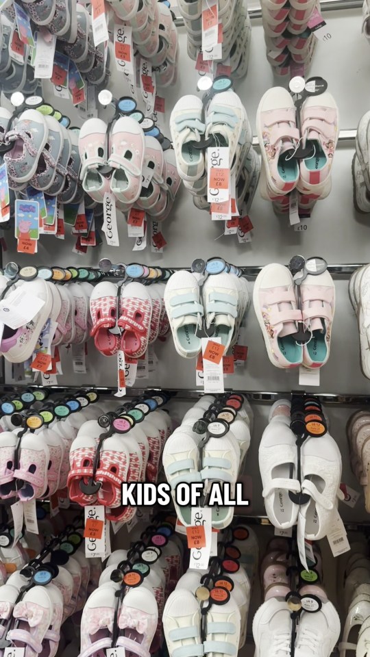 Many children's shoes on display, reduced to £3.