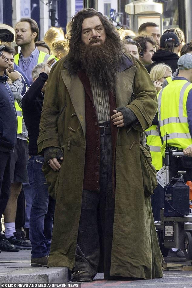 It is known that sometimes in films and TV shows that actors will use body doubles - and in this case, it is to make Hagrid look bigger as he is 11 ft 6 inches