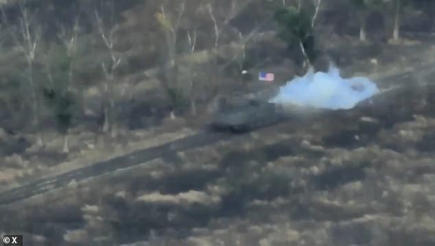 They were filmed waving the US flag alongside the Russian tricolour in a captured American M113 armoured personnel carrier captured from Volodymyr Zelensky's forces