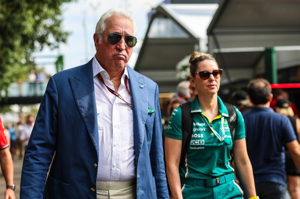 Lawrence Stroll, Aston Martin executive chairman, walking in the paddock.