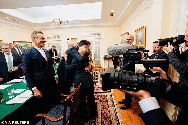 Ukrainain President Volodymyr Zelenskiy hugs Italian Prime Minister Giorgia Meloni, during a meeting with some of the European leaders
