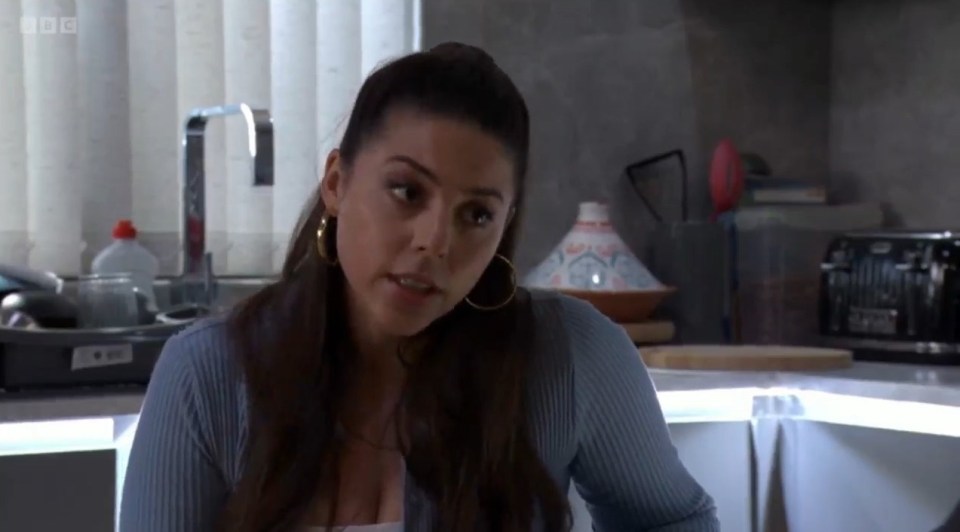 Priya listens intently.