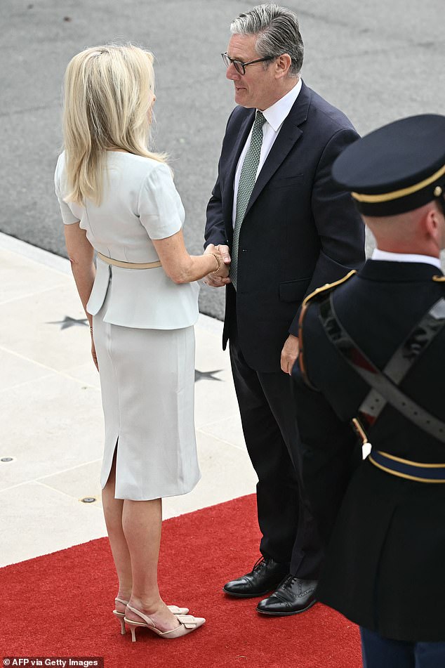 Sir Keir Starmer is greeted by US chief of protocol Monica Crowley at the White House today