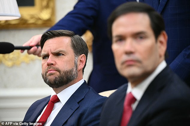 JD Vance looks on during a meeting with US President Donald Trump and Ukrainian President Volodymyr Zelensky