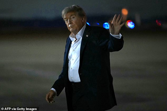 President Donald Trump arrives at Joint Base Andrews in Maryland after his summit in Alaska