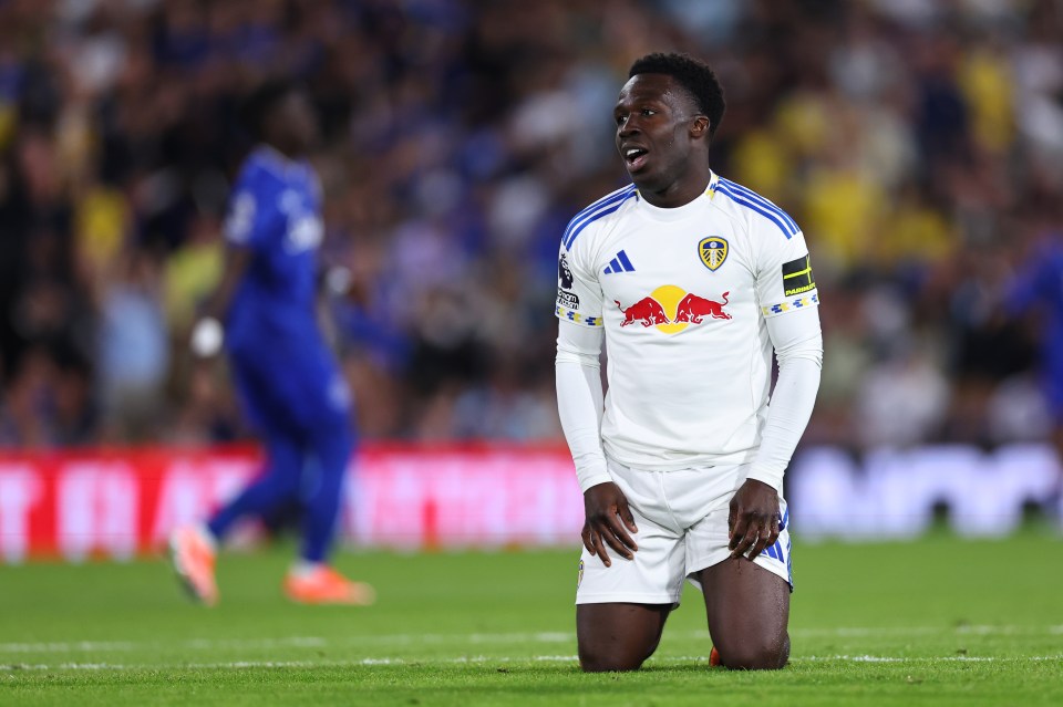 Wilfried Gnonto of Leeds United kneeling on the field.