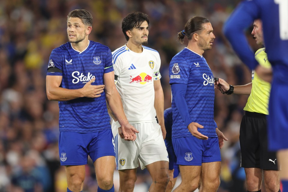 Everton players reacting to a handball call.
