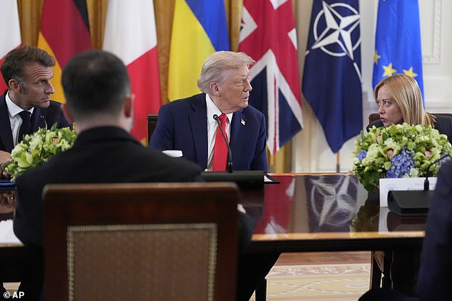 Trump, centre, speaks with Italy's Prime Minister Giorgia Meloni, right, and France's President Emmanuel Macron, left