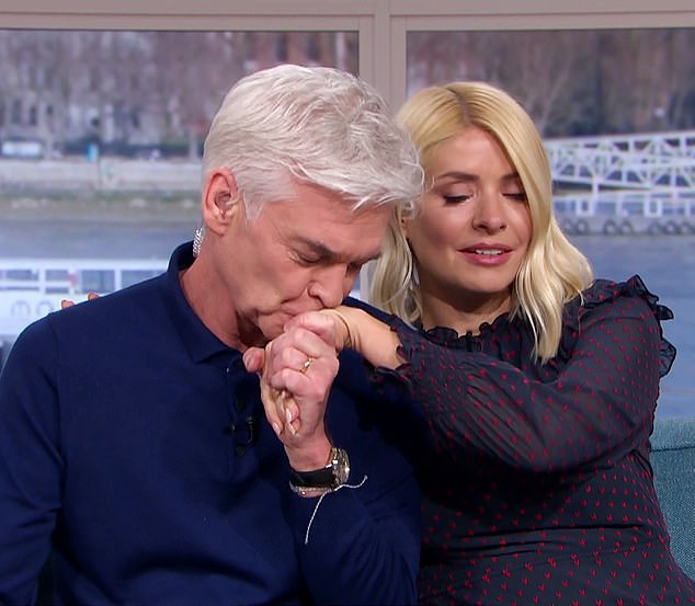 In February 2020, Schofield, pictured with co-host Holly Willoughby, praised his 'remarkable' wife after he announced his sexuality live from the This Morning sofa