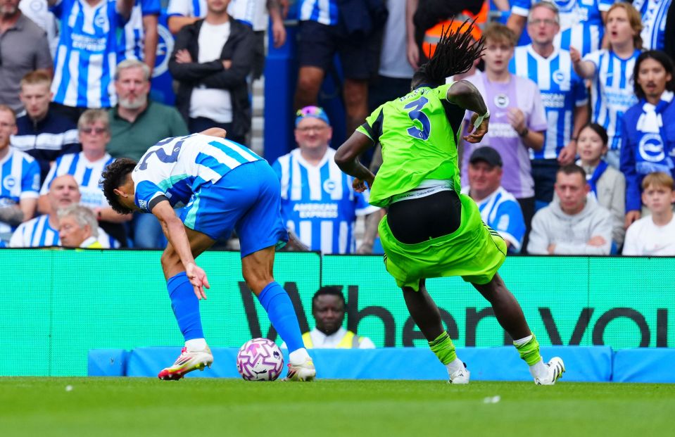 Calvin Bassey of Fulham nearly loses his shorts during a soccer match.