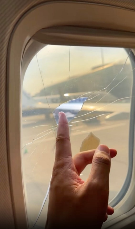 Cracked airplane window.
