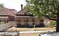 The home seen in 2022 after lying empty and abandoned with hail damage