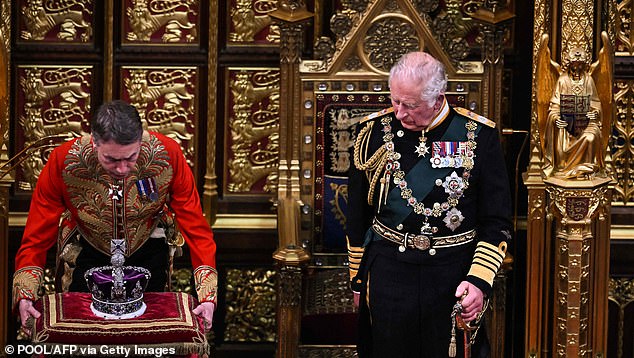 Charles appeared emotional as he looked at his mother's crown before he read the Queen's Speech in his mother's absence in 2022, supported by his wife Camilla
