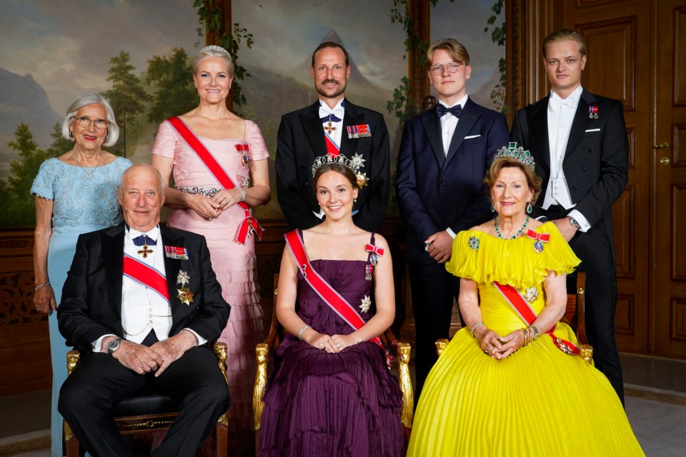 The 28-year-old (top right) with the Norwegian Royal family