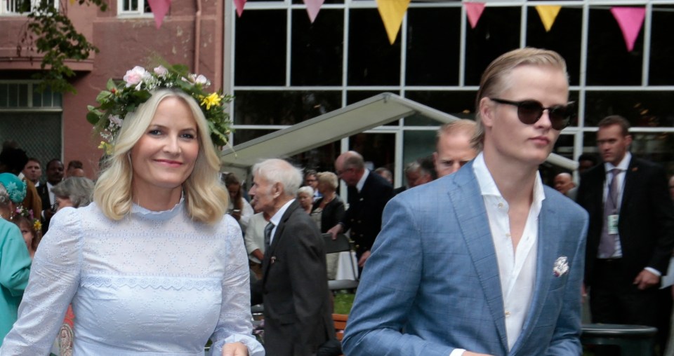 Picture taken on June 23, 2016 in Trondheim, Norway, shows Marius Borg Høiby next to his mother Norwegian Crown Princess Mette-Marit as they attend a garden party. The 27-year-old son of Norwegian Crown Princess Mette-Marit was arrested at the weekend on suspicion of assaulting a woman, police said on August 7, 2024. Mette-Marit's son Marius Borg Hoiby was born in 1997 from a relationship prior to her 2001 marriage to Norway's future king Crown Prince Haakon. (Photo by Lise Åserud / NTB / AFP) / Norway OUT (Photo by LISE ASERUD/NTB/AFP via Getty Images)
