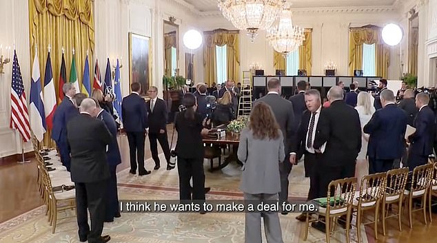 While waiting for their counterparts in the East room of the White House, Trump leaned over to Macron and was caught saying: 'I think he wants to make a deal for me