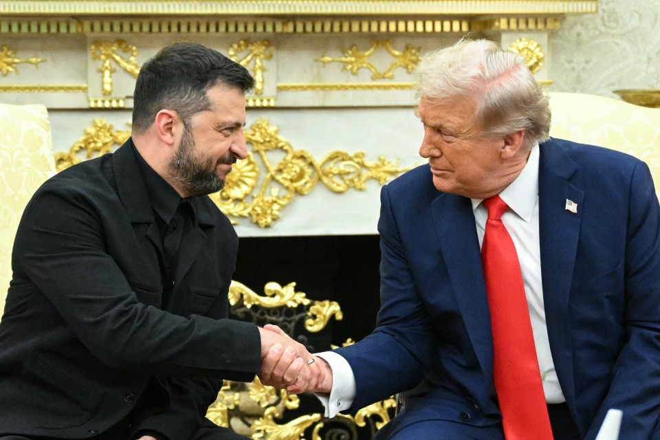 Zelensky and Trump shaking hands at a meeting.