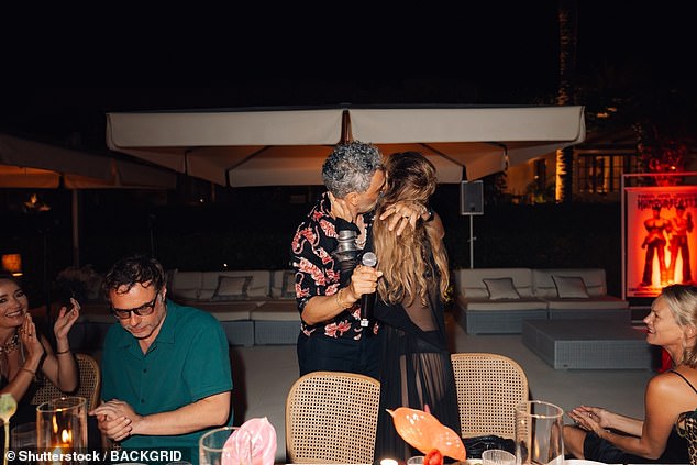 Rita and Taika put on a loved-up display as they kissed after he made a speech