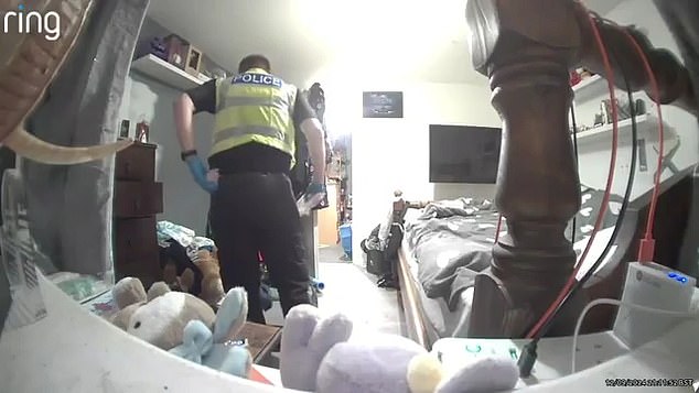 He hides it in his back pocket and then slowly walks out of the room. He has now been jailed for four months