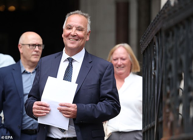Epping Forest District Council leader Chris Whitbread leaves the Royal Courts of Justice today after securing a temporary injunction against the use of The Bell Hotel to house asylum seekers