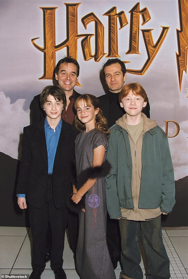 Harry Potter film actors Daniel Radcliffe, Emma Watson, Rupert Grint, David Hryman, Chris Columbus at the Harry Potter and The Philospher's Stone premiere in 2001