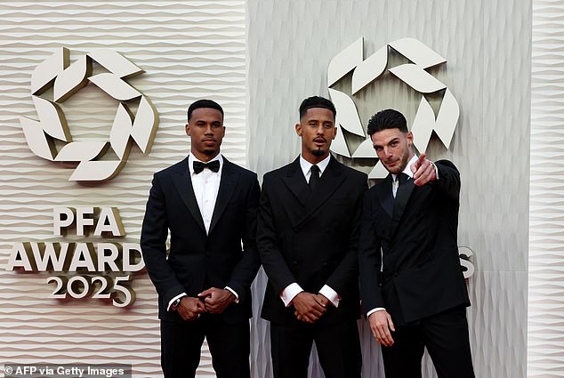 Arsenal stars (L-R) Gabriel, William Saliba and Declan Rice opted for a simple approach for the ocassion