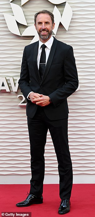 Former England manager Sir Gareth Southgate made an early appearance, decked out in a classic black suit