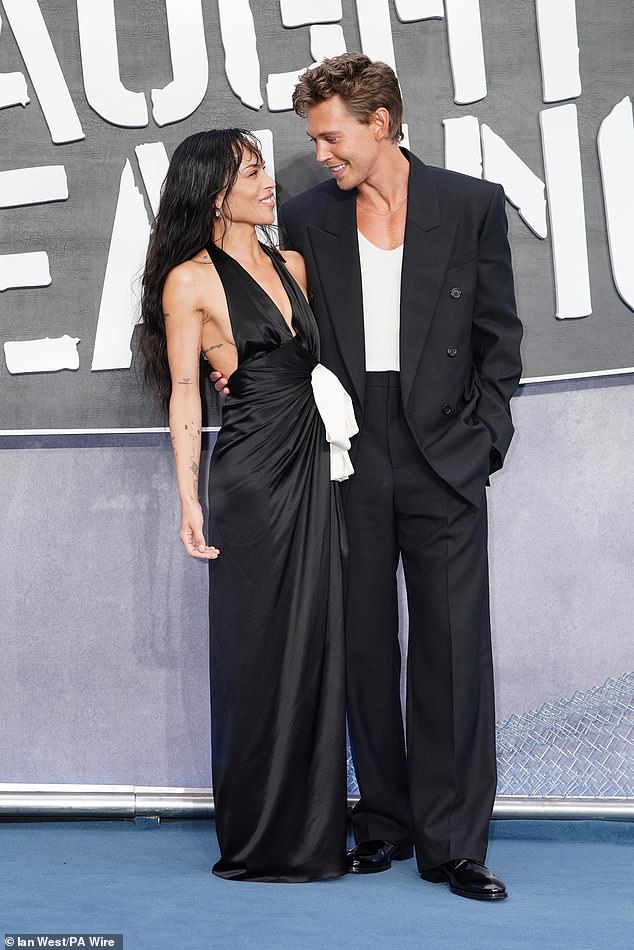 The actress, 36, who stars as Yvonne in the film, wore a black, plunging halterneck gown as she walked the blue carpet at Odeon Luxe in Leicester Square
