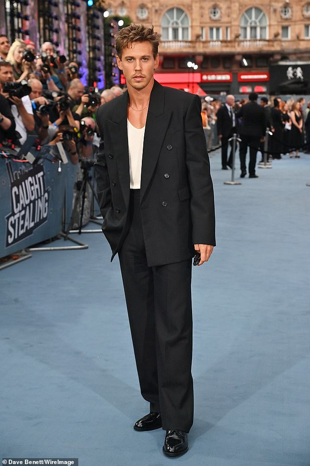Austin, 34, who plays lead character Hank Thompson, wore a stylish, oversized blazer and matching trousers