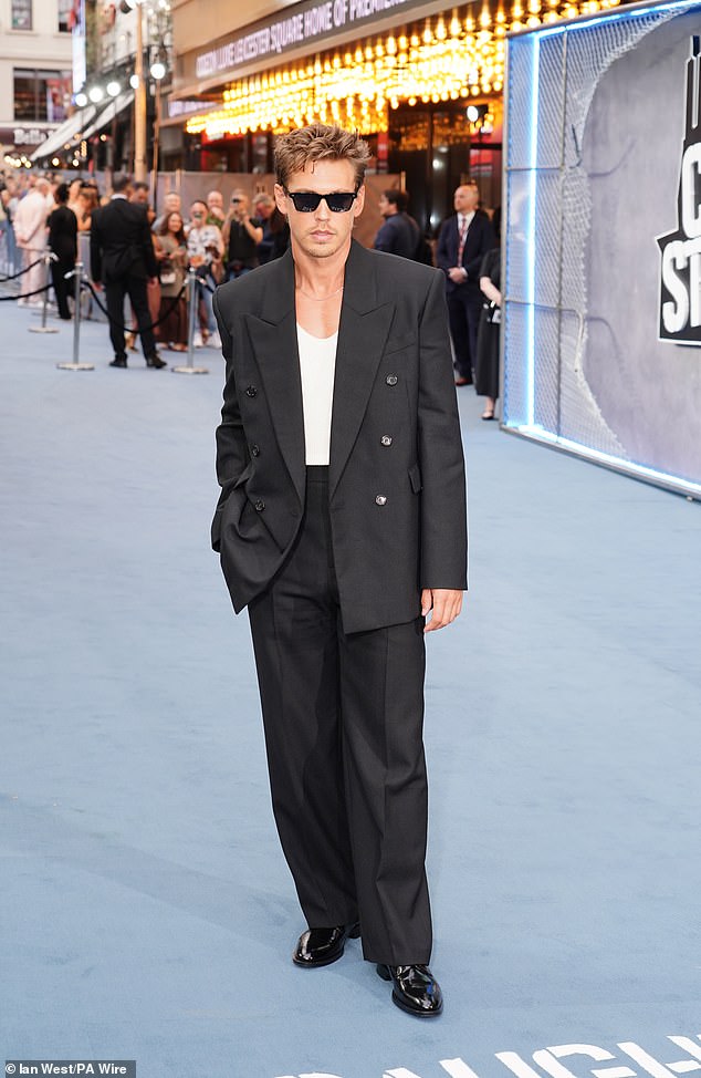 He shielded his eyes with a pair of RayBan sunglasses