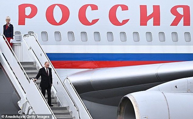 Putin flew into Alaska on the 'Flying Kremlin' with the motorbike: It was unclear if the bike was on his plane or on an accompanying aircraft