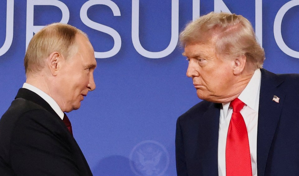 Presidents Trump and Putin at a press conference.