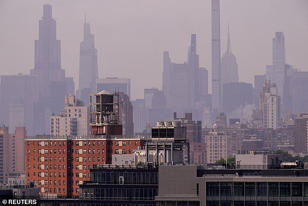 Cooling towers and air conditioning units are seen in the Harlem neighborhood amid a Legionnaires' disease outbreak in New York City