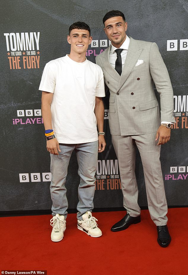 Meanwhile the Manchester City star posed for snaps with Tommy at the premiere of his documentary Tommy: The Good. The Bad. The Fury in The Printworks