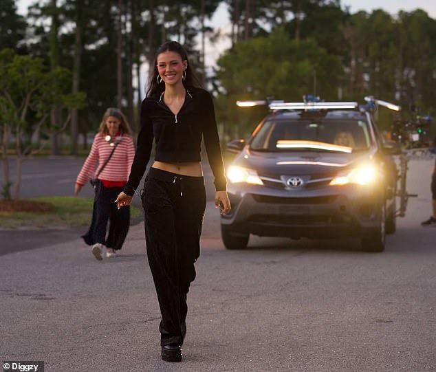 Brooklyn's ever-presence alongside Nicola (pictured) on set won't come as a surprise to some, given his growing feud with his parents David and Victoria in recent months