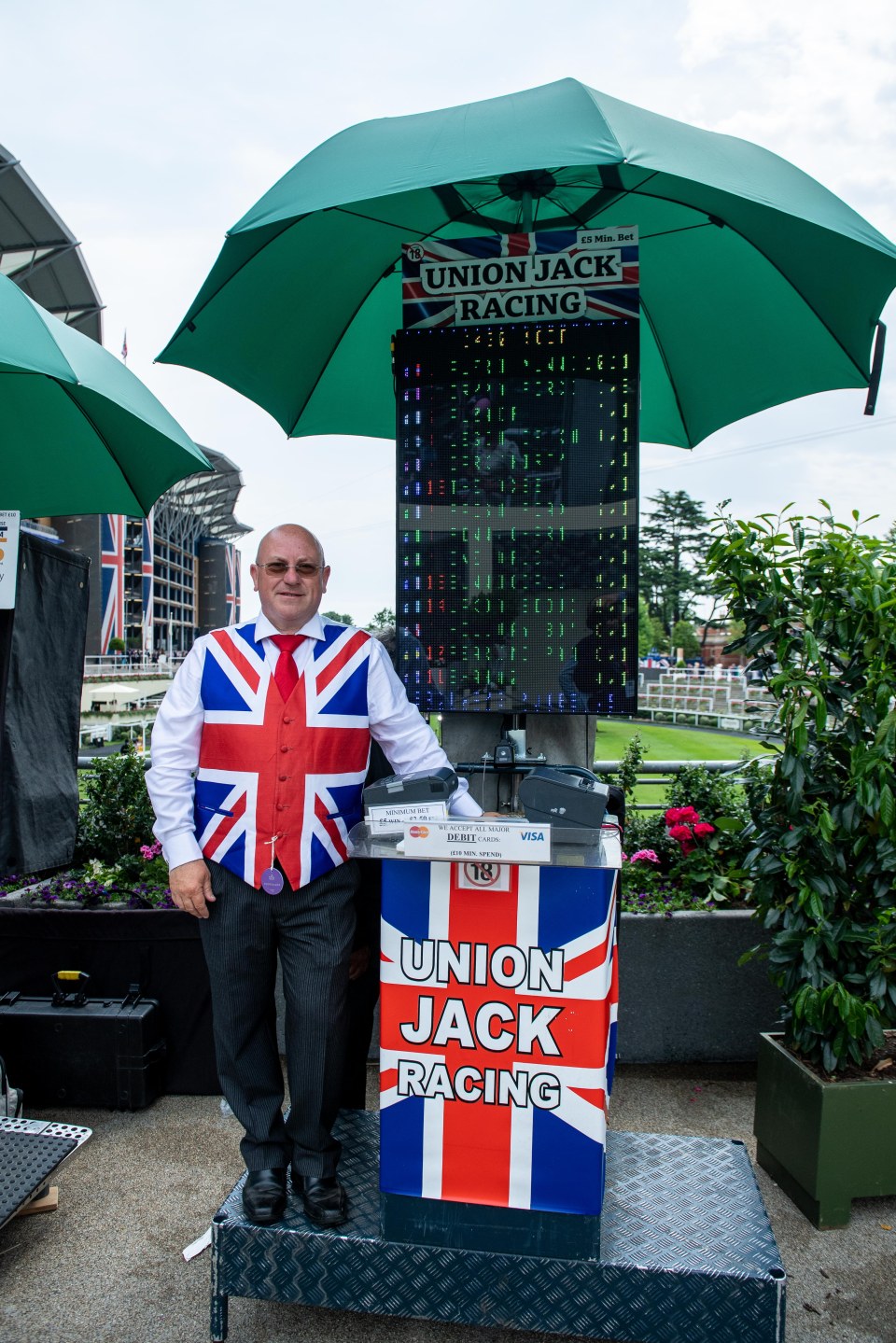 Bookmaker at Royal Ascot wearing a Union Jack waistcoat.