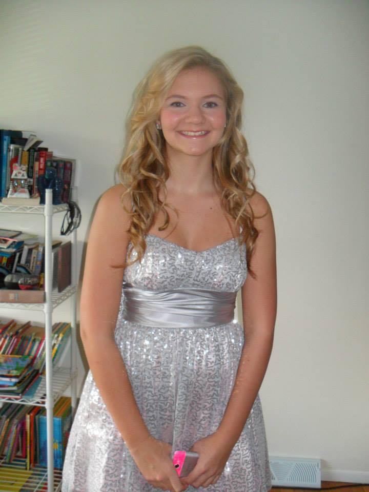 Anjelica Ginter, sister of Gina Ginter, in a silver sequined dress.