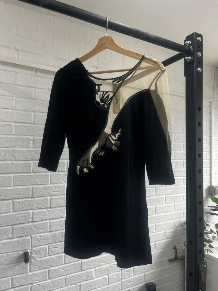 Black Topshop dress with panther design.