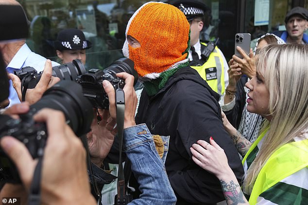 J. J. O Dochartaighwas also seen going into the court to support his fellow band member