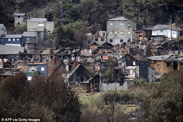 A general view of San Vicente de Leira, in the Spanish northwestern province of Ourense is seen after a wildfire on August 19, 2025