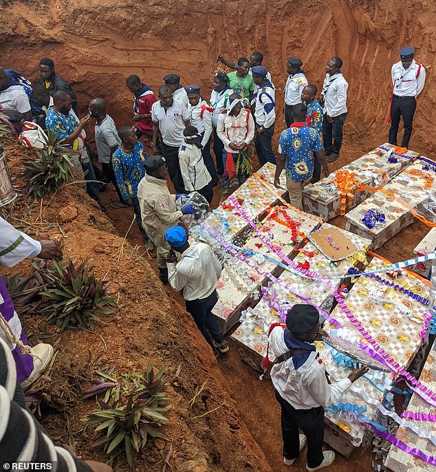 HRW believes the true death toll may exceed 300, echoing similar UN findings earlier this month. Pictured: Civilians bury the remains of people killed in an attack carried out by Islamic State-affiliated Allied Democratic Forces (ADF) at a church, in Komanda, northeastern Democratic Republic of Congo, July 28, 2025