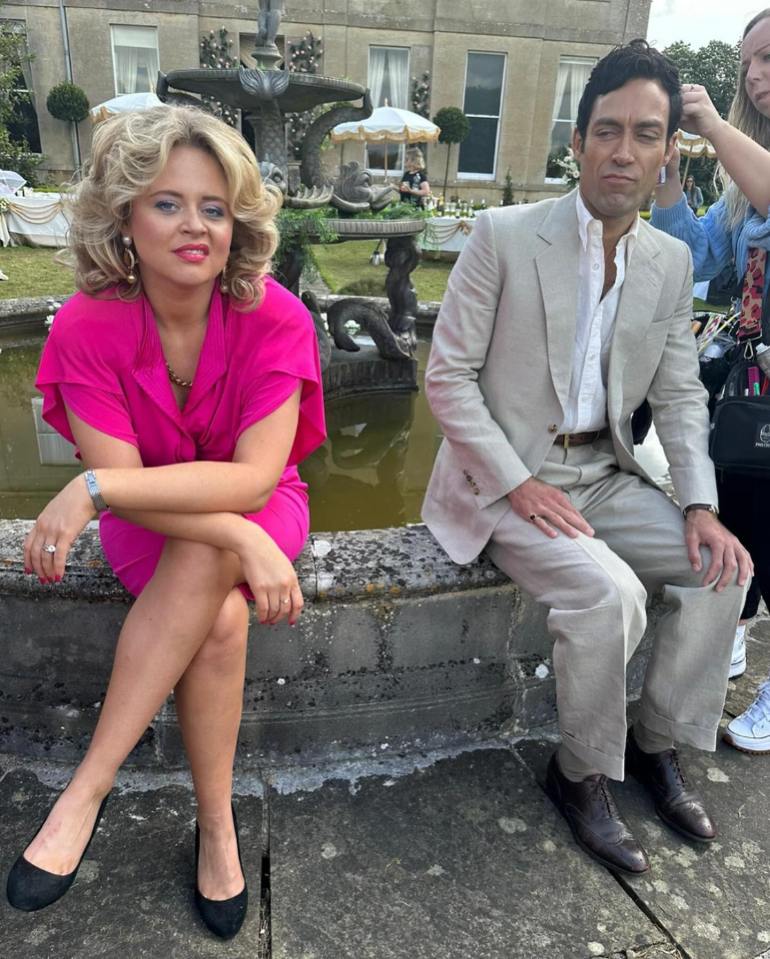 Emily Atack and a male cast member on the set of Rivals.