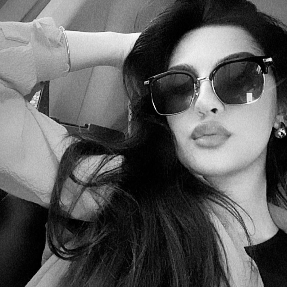 Black and white photo of Madia Kauser.