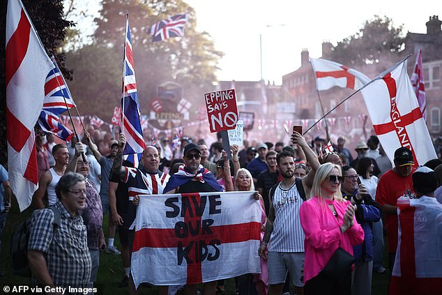 Town hall leaders said they are already looking to follow Epping Forest District Council and take legal action to prevent small boat arrivals being placed in local hotels (pictured: protesters in Epping this month)
