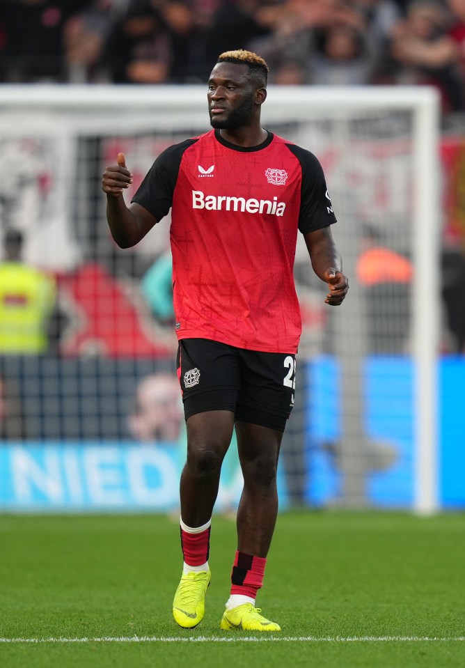 Victor Boniface of Bayer 04 Leverkusen celebrating a goal.