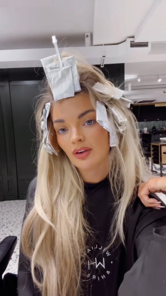 Helena Ford with foils in her hair at a hair salon.